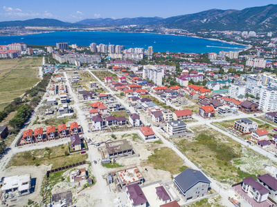 Construction of cottages in the seaside town.  Houses on the sho