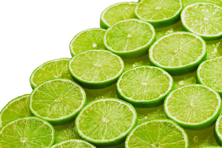 Fresh lime slices as a background. 