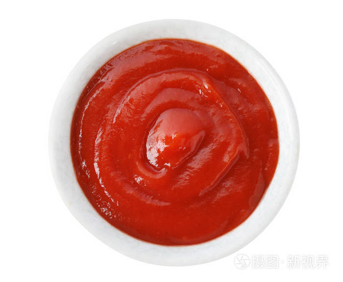 美味的番茄酱在碗里孤立的白色顶视图