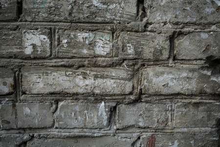 Texture of an old paint covered brick wall. Background image of 