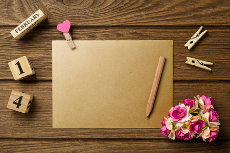 Mockup blank envelop on wood table for Valentines Day. Mock up 