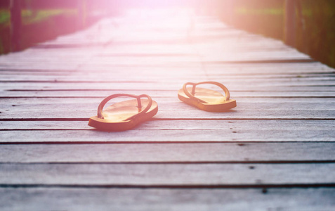 Sandal on wooden floors with sunlight, Top view 