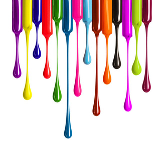 Colorful drops of nail polish drip from brushes closeup on whit