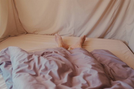 A man sleeping in bedroom 