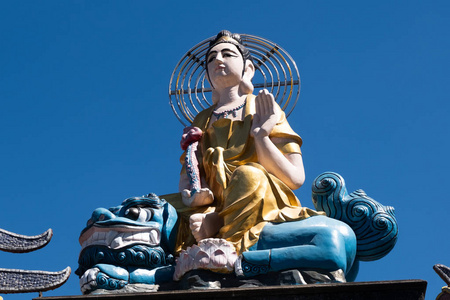 Buddha statue and blue sky background 