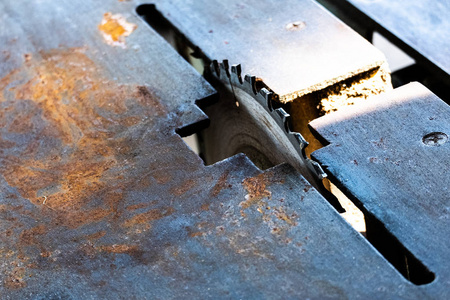 Old Wood cutting machine in house 