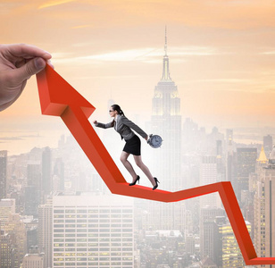 经济复苏概念中的女商人爬升线图照片