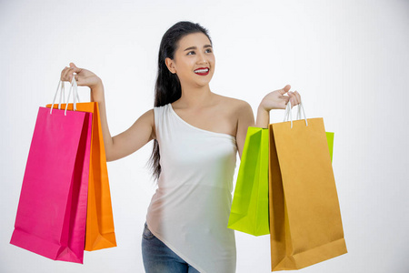 Asian women Beautiful girl is holding shopping bags and smiling 