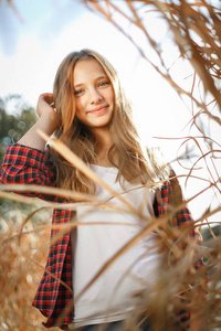 Lifestyle sunny portrait of young smiling teenage girl  