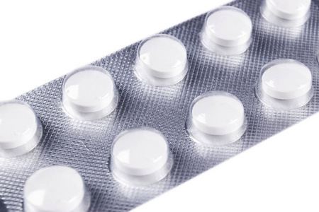 泡罩包装的成堆药片.银色铝箔吸塑包装.制药工业.药品.药物和药物.