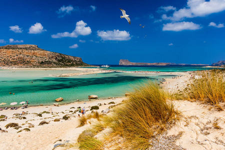 Balos Lagoon and Gramvousa island on Crete with seagulls flying 