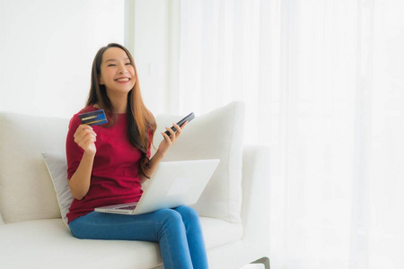 Portrait beautiful young asian women using computer laptop with 