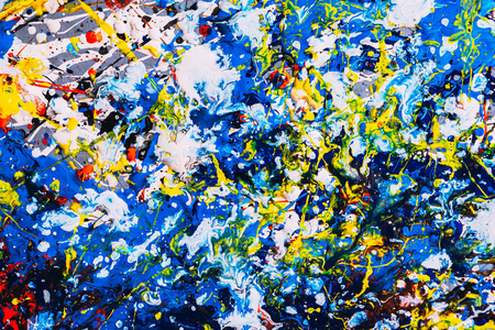 抽象表现主义。用滴水技巧画的画。混合不同颜色的红黄蓝白黑。