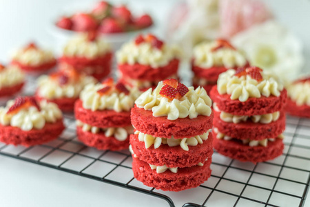 Miniature Red Velvet Cakes with cream cheese frosting and fresh 