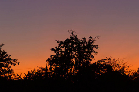 Evening sunset in the village a far away from the city. The sky 