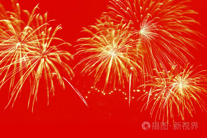 红色背景上的金色烟花庆典