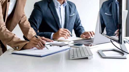 Business team partner working with computer, laptop, discussion 