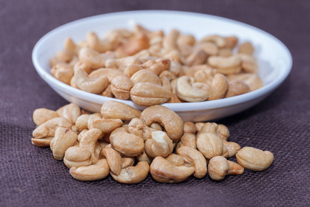 close up of Stack of Cashews on bowl 