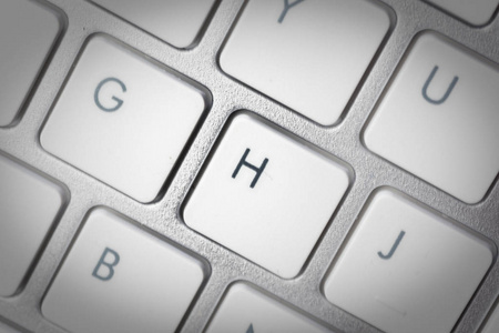 电脑键盘带有按钮H的笔记本电脑的银色键盘