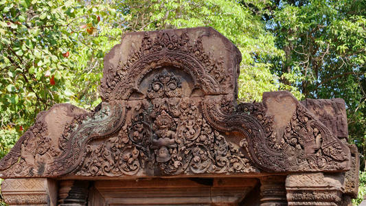 Stone ruin of carving art details at Banteay Srei Angkor temple 