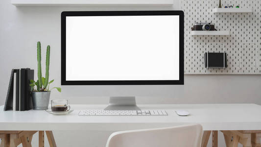 Close up view of workspace with blank screen computer,  su