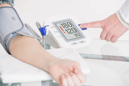 Doctor measuring blood pressure 