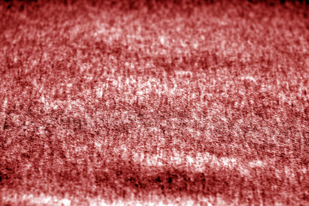 织物纹理具有模糊效果的红色色调。