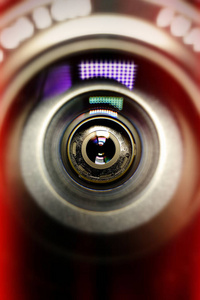 背景上的相机镜头进行概念设计.摄影师名片.深色背景.技术概念.