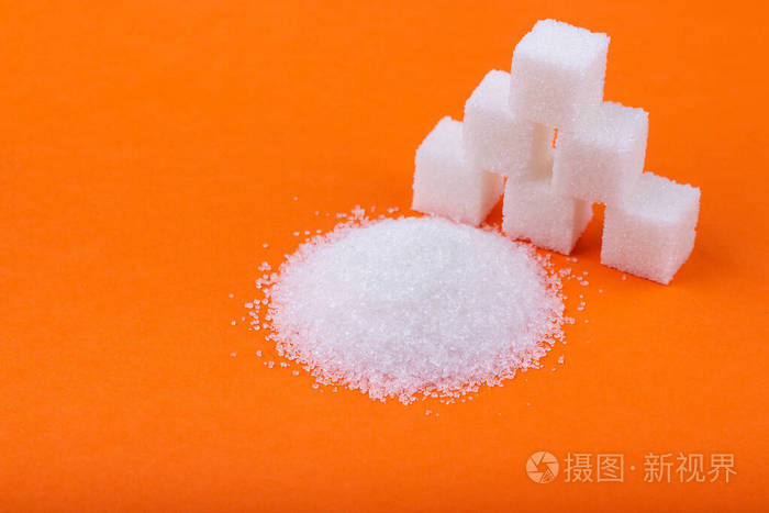 橙色背景的白糖和砂糖照片 正版商用图片27m8bs 摄图新视界 橙色背景的白糖和砂糖照片 正版商用图片27m8bs 摄图新视界