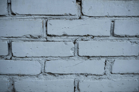 Texture of an old paint covered brick wall. Background image of 