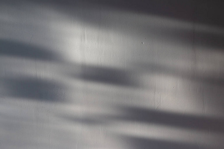 抽象的灰色阴影背景在墙上，选择性聚焦
