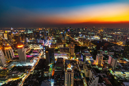 Bangkok city downtown and road traffic at sunset in Thailand 