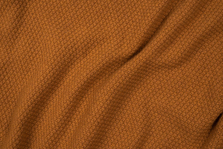 Brown knitted fabric pattern. 