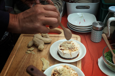 Woman cooking Homemade agedashi tofu with soy sauce 