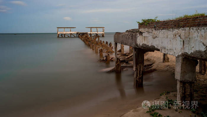 Dilapidated old fishing dock collapsing into the sea in Pak Nam 