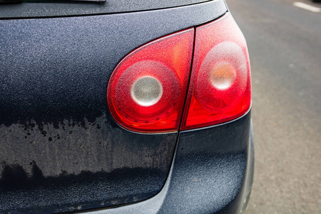 First thin layer of snow on cars in the morning. Winter season, 