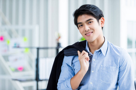 Portrait of a cheerful mature businessman at In the  room 