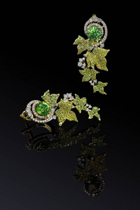 luxury yellow gold earrings with green demantoids and diamonds 