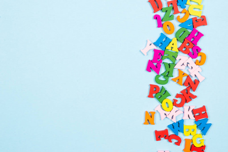 Multicolored letters on a blue background. 