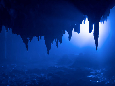 Black silhouette of limestone protrusion within the underground 