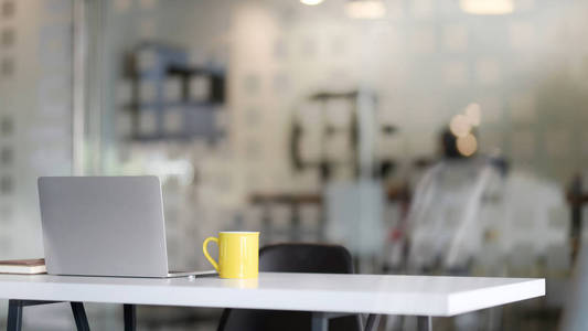 Close up view of workplace with  tablet,  supplies and yel