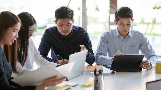 Cropped shot of group of business persons consulting on their pr