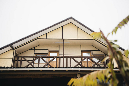 Part of the facade of a wooden house in modern style 