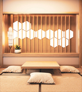 Ryokan room with hexagon light on wall decoraion and tatami mat 