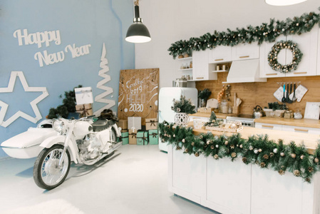 Christmas home decor, photo zone with retro scooter and kitchen 