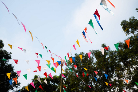 Colorful triangle flags with blue sky 