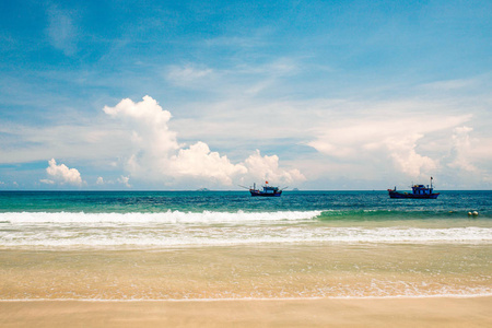 Empty tropical beach background. Boat in the sea.