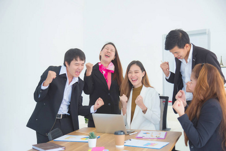 Group of happy asian business people in . 