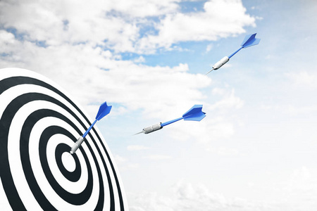 三支飞镖箭射向目标中心摄影图