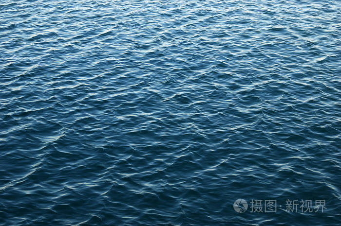 Blue sea surface with waves 